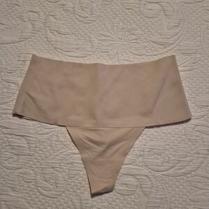 Spanx women's size small tan high waisted thong panty, side seam damage